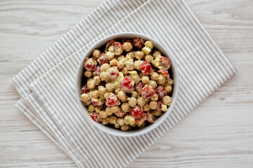 Homemade Pesto Chickpea Snack Salad in a Bowl, top view. Flat lay, overhead, from above.