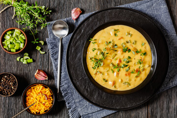 Beer cheese soup with vegetables and thyme