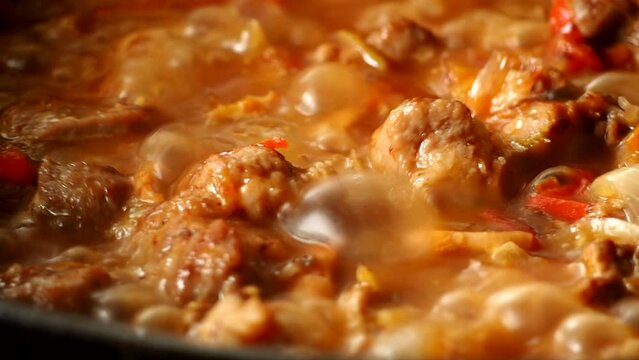 Stewing chopped pork with sauce in pan, in door  Chiangmai  Thailand.