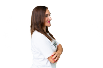 Middle age volunteer woman over isolated chroma key background in lateral position
