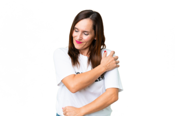 Middle age volunteer woman over isolated chroma key background suffering from pain in shoulder for having made an effort