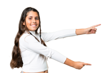 Young girl over isolated chroma key background pointing finger to the side and presenting a product