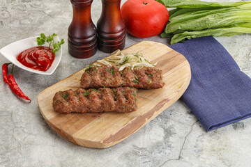 Kebab with beef served onion