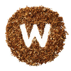 Letter W made of cigarettes dried smoking tobacco on white background