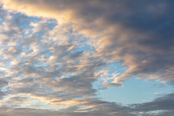 Colorful clouds at sunset as background