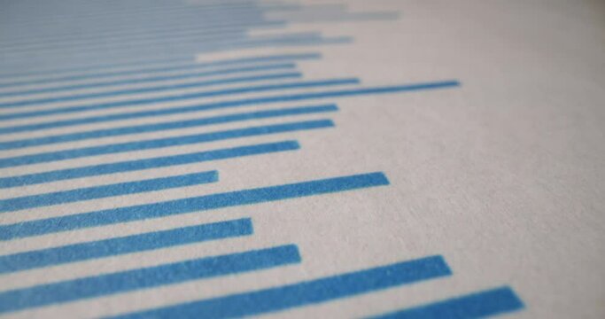Histogram charts and diagrams printed on white sheets of paper for data analysis. Studying statistics