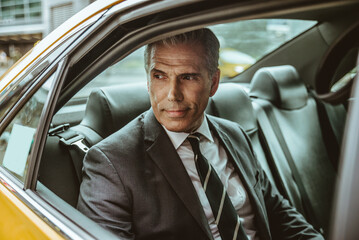 Senior businessman wearing elegant suit in New York - Handsome mature adult business manager...