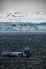 Cruise to Hubbard Glacier Bay in Alaska with floating ice bergs and drift ice floes on ocean water...