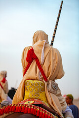 Equestrians participating in a traditional fancy dress event named Tbourida in Arabic dressed in a traditional Moroccan outfit and accessories of the knights