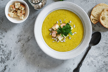 Vegetable soup, creamy cauliflower sweet potato soup with toasted bread croutons and sunflower seeds