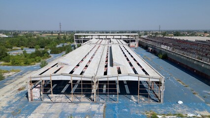 The former Fibronit factory is an abandoned industrial site where the production of products containing asbestos was carried out - asbestos factory remediated environmental remediation