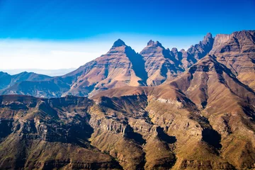 Foto op Canvas Aerial view of Cathedral Peak in Drakensberg mountains, at the Lesotho border in KwaZulu-Natal province, South Africa © pierrick