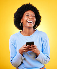 Woman, laugh and typing on smartphone in studio, reading funny social media post and mobile news on...