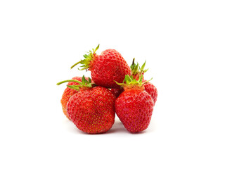 Ripe strawberry with leaves.