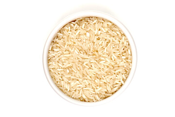 Raw, uncooked basmati rice, ingredients for pilaf, isolated on a white background. High resolution image.