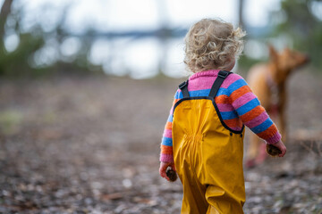 Fototapeta premium baby in the wild forest together walking in a park
