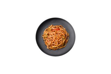 Delicious asian udon dish with vegetables, mushrooms, salt and spices
