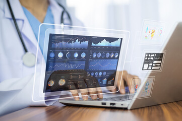 Doctor using computer backup data on Cloud Computer technology and storage online for computer,...