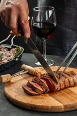 Barbecue steak with green asparagus and red wine. Healthy dinner or lunch. vertical image. top view. place for text