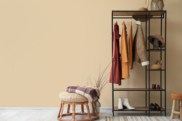 Interior of hall with shelving unit, clothes and shoes - obrazy, fototapety, plakaty