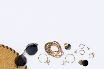 Jewelry with sunglasses on white background