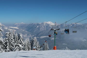 Ski lift on a snowy mountain in the alps