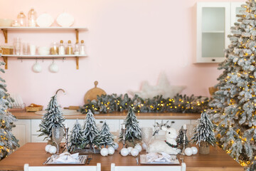 Christmas decor on table in kitchen