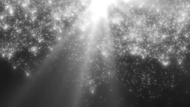 Black and white ray on a black background and falling black and white dust.