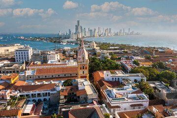 Walled old city of Cartagena de Indias on contrast with modern skyline of Bocagrande aerial view