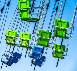 seats of a typical chain carousel