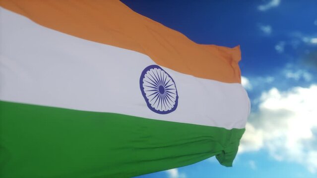 Realistic flag of India waving in the wind against deep blue sky