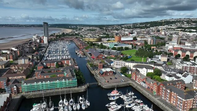 Editorial Swansea, UK - August 30, 2023: Drone view from Swansea Marina including the new Swansea Arena, Leisure Centre and Maritime museum in South Wales UK

