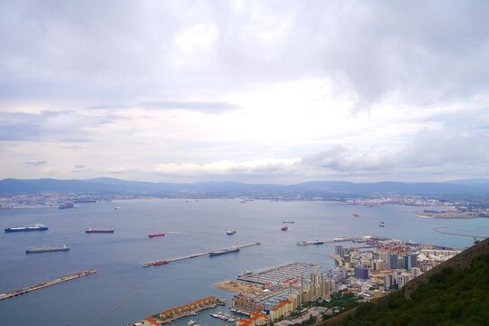 view over Gibraltar with its port and the Bay of Gibraltar at a cloudy day, Skywalk Gibraltar, Rock of Gibraltar, Puente Mayorga, Algeciras, British, Andalusia, Spain