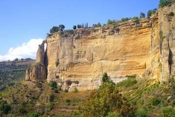 Fototapeta na wymiar stunning view to the El Tajo de Ronda canyon with the Guadalevín River in Ronda, Málaga, Andalusia, Spain