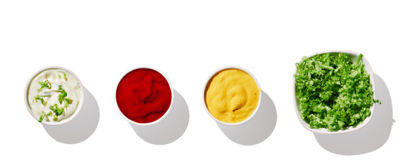 ketchup, mayonnaise, mustard and salad in bowl on whitebackground