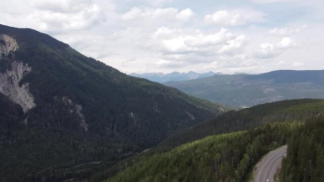 Drone Aerial Sphere Turn Left Nature Shot of Valley and Highway in British Columbia Beaver Canada. Left Turn Sphere 180 Degree Showing Aerial Natural Valley Landscape.