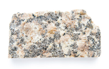 Piece of granite stone close up on a white background