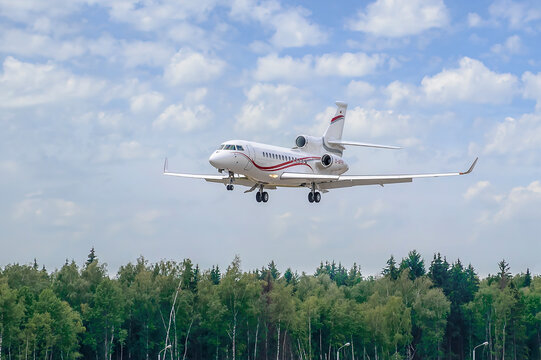 Private business jet Dassault Falcon 7X with tail number D-AFPR comes in for a landing at Vnukovo airport. Jet business aviation. Moscow, Russia - July 2, 2014