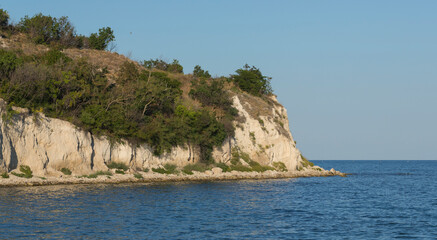 Fototapeta na wymiar Resorts in Bulgaria. The Black Sea coast. Cape, sedimentary rocks, coastline.