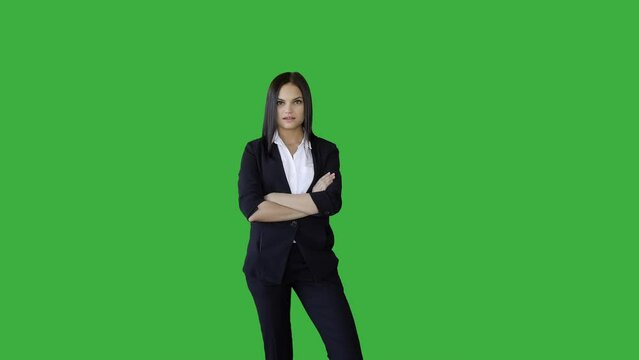 Attractive Young Businesswoman Standing Against Green Screen Background