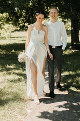 Fototapeta premium Young wedding couple on their wedding
