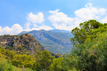 Beautiful view of the green mountains from the popular Oludeniz beach in Turkey