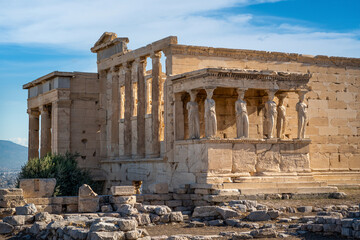 Fototapeta na wymiar The Caryatids in the Erechtheon, Greek temple created in honor of the gods Athena Polias and Poseidon