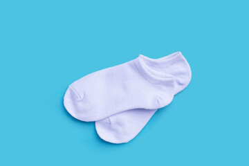 White socks on blue background.