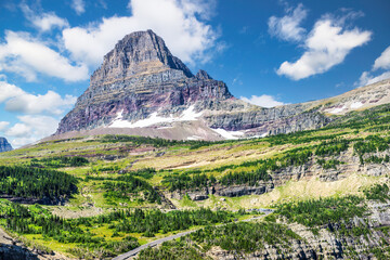 Clements Mountain and Going-To-The Sun road winding up to Logan Pass Visitor Center in Glacier...
