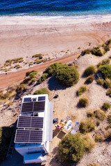 Caravan with tilt solar panels on roof. Aerial view. © Voyagerix