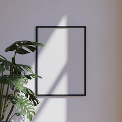 clean minimalist frame mockup poster hanging on the white wall lit by sunlight with plant decoration