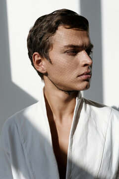 Effeminate man with face net