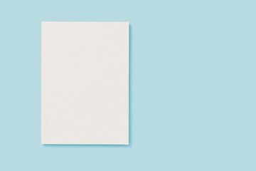 White blank cover magazine mockup on blue background