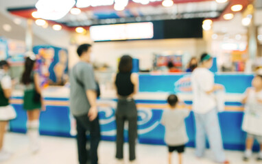 Abstract blurred of people in shopping mall of department store for background